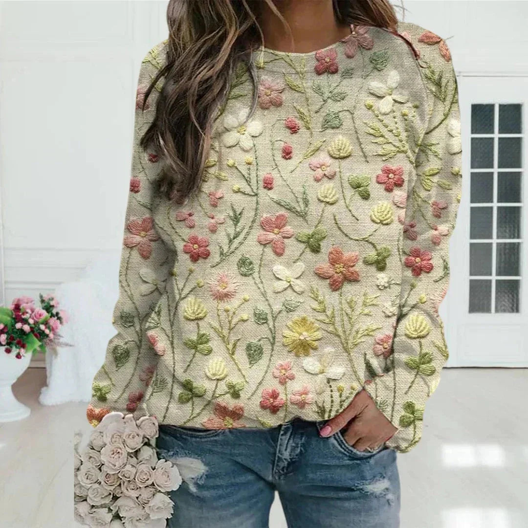 Damen Blumenpullover in Beige, aus weichem Baumwollmix, mit floralem Stickdesign an der Vorderseite für einen frischen Look.