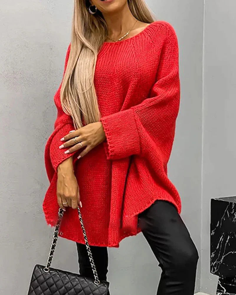 Roter Damen Cape-Strickpullover mit weiten Ärmeln, hergestellt aus weichem, bequemem Material für lässige Looks.