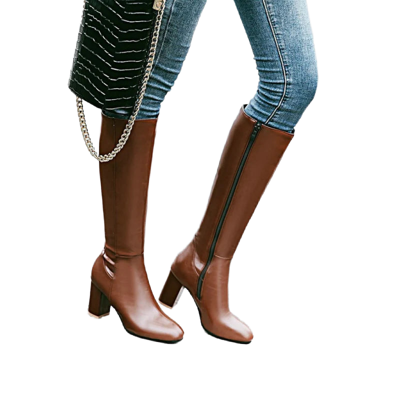 Braune Damen Stiefel aus Leder mit Blockabsatz und seitlichem Reißverschluss für bequemen Tragekomfort.