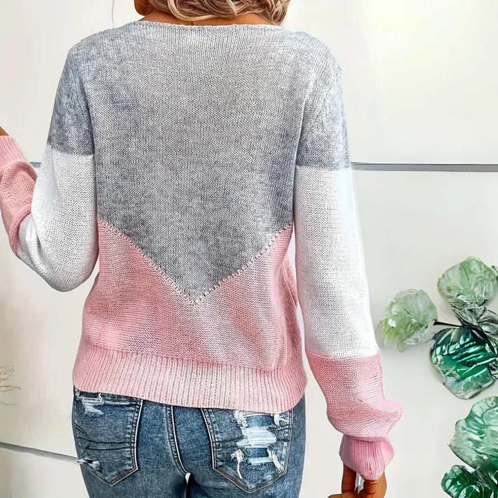 Damen Jumper aus weichem Material mit V-Ausschnitt, kontrastierenden Farben und strukturiertem Strickmuster, ideal für den…