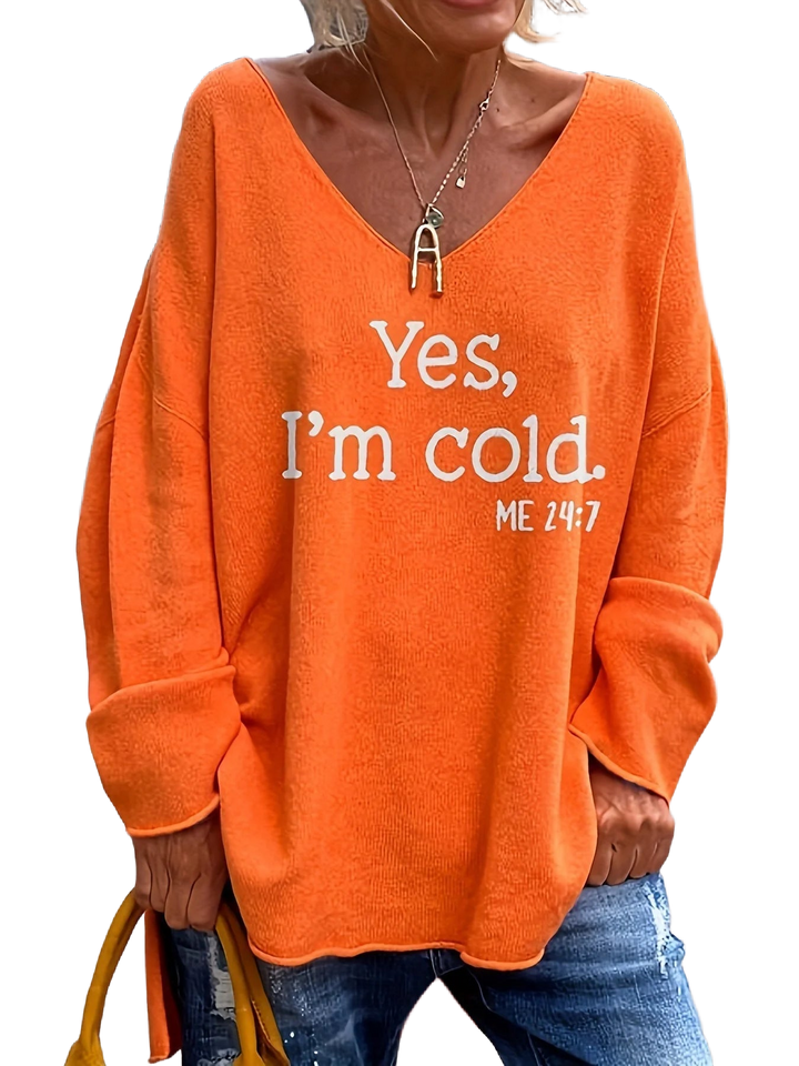 Damen Oversize Pullover in Orange-Rot, V-Ausschnitt, weicher Stoff, mit auffälligem Statement-Print für lässige Looks.