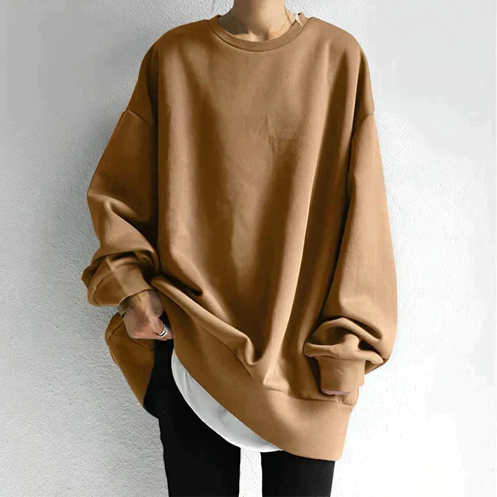 Braunes Damen Oversize Sweatshirt aus weichem Material, Rundhalsausschnitt und langen Ärmeln für bequemen Alltag.