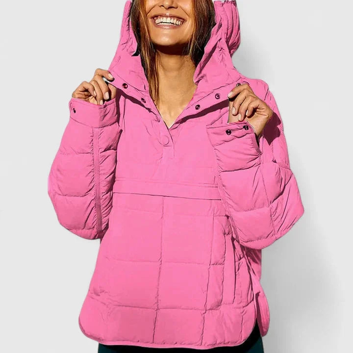 Rosa Damen Oversized Kapuzenpulloverjacke aus wasserabweisendem Material mit praktischen Seitentaschen und lässigem Schnitt.