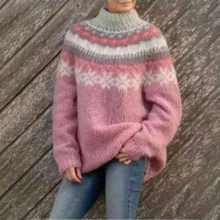 Rosa Damen Pullover mit Fair Isle Muster, entspanntem Schnitt und weichem Material für komfortable Trageeigenschaften.
