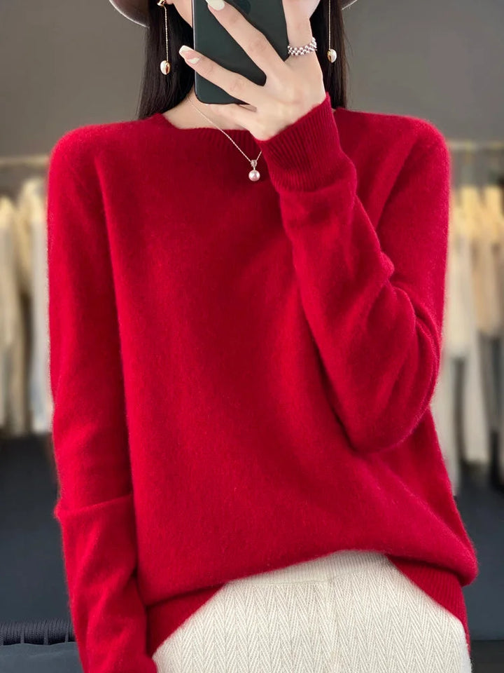 Roter Damenpullover mit langen Ärmeln, aus weichem Baumwollstrick, ideal für kalte Tage und gemütliche Outfits.