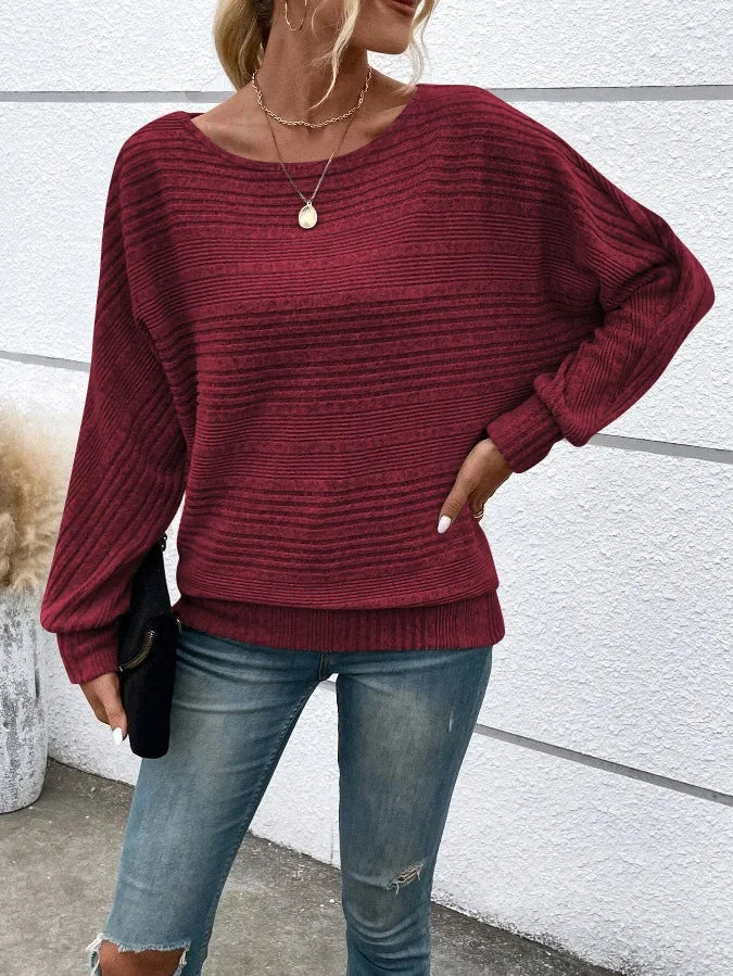 Damen Pullover mit Streifen, weiter Rundhalsausschnitt, aus weichem Baumwollmix für komfortablen Sitz und lässigen Stil.
