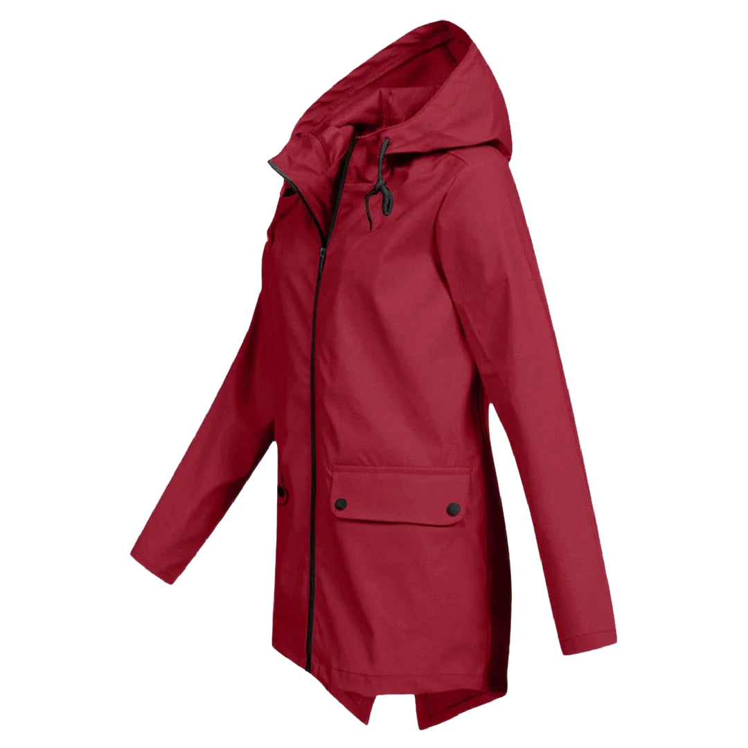 Damen Regenjacke mit Kapuze aus wasserdichtem Material, ausgestattet mit praktischen Taschen und modischem Schnitt.