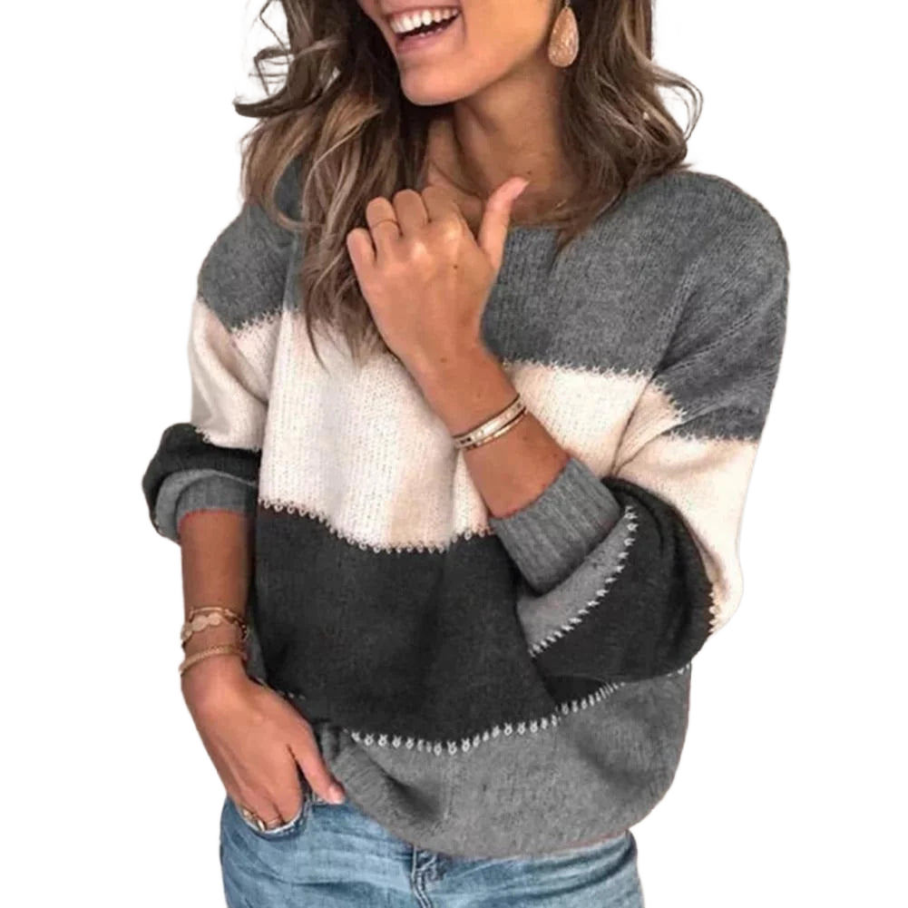 Damen Vintage Strickpullover in Grau, aus weichem Material mit langen Ärmeln und klassischem Rundhalsausschnitt.