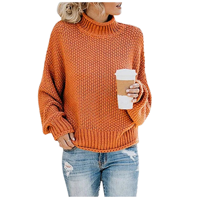 Orange Damen Strickpullover mit Rollkragen, langen Ärmeln und leichter Struktur aus weicher, warmer Wollmischung.