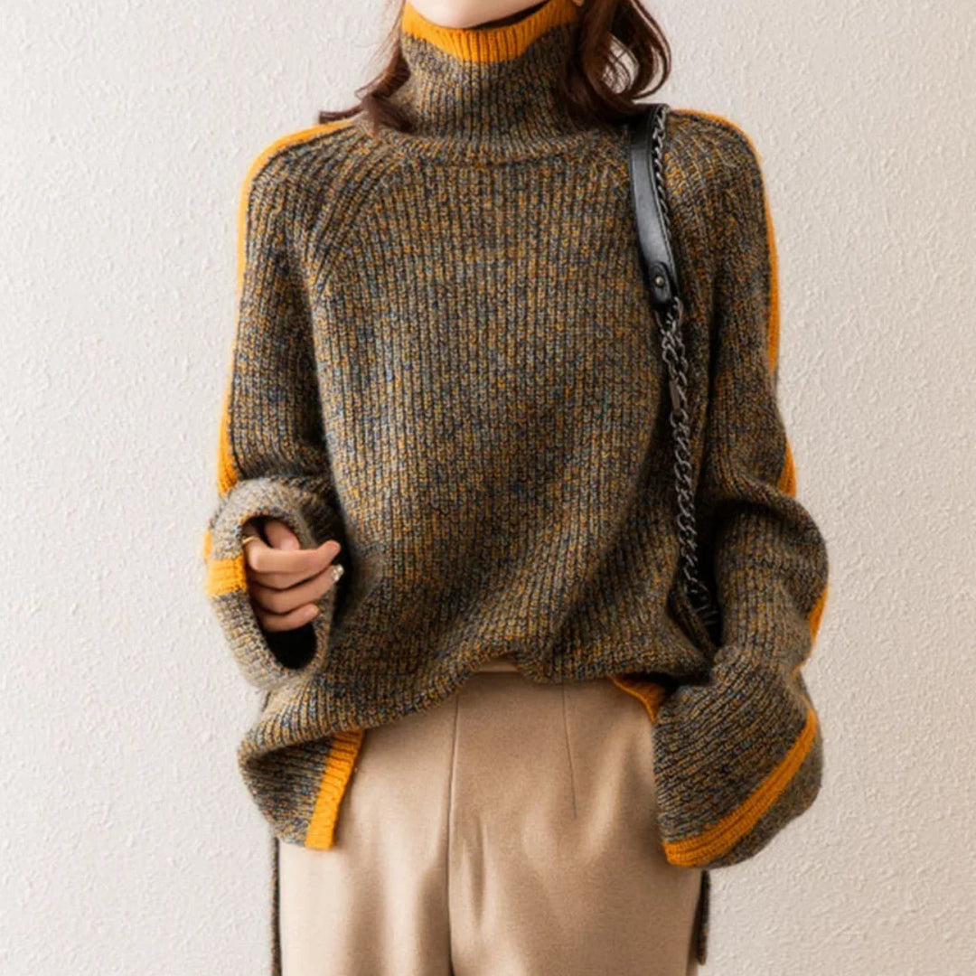 Brauner Damen-Strickpullover aus weichem Material mit Rollkragen und lässigem Oversize-Design für einen entspannten Look.