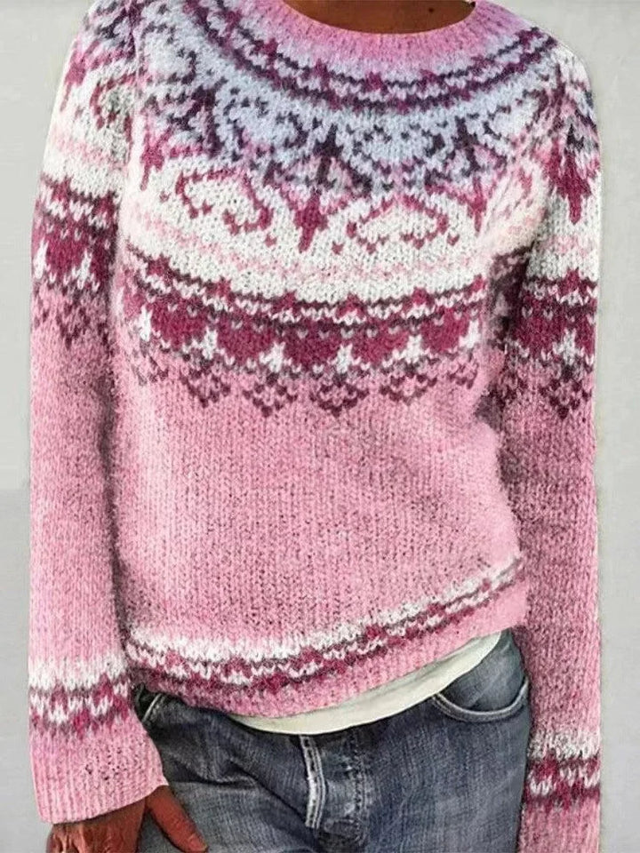 Damen Strickpullover mit Rundhalsausschnitt, aus weicher Wolle, mit traditionellem Norwegermuster in eleganten Farben.