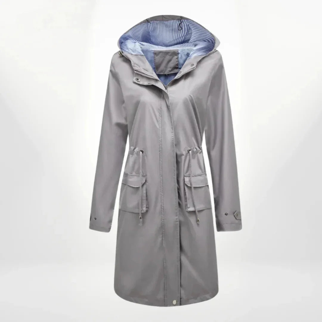 Grau Damen Trenchcoat mit Kapuze, aus hochwertigem Material, verfügt über praktische Taschen und einen zeitlosen Schnitt.