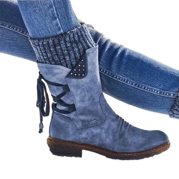 Damenstiefel in Blau, aus Kunstleder, mit Schnürung und Nietenakzenten für ein modisches Design. Ideal für den Alltag.