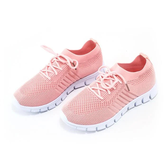 Hellrosa atmungsaktive Damen Sneakers mit orthopädischer Sohle, ideal für aktive Tage unterwegs, kombiniert Komfort und Stil…