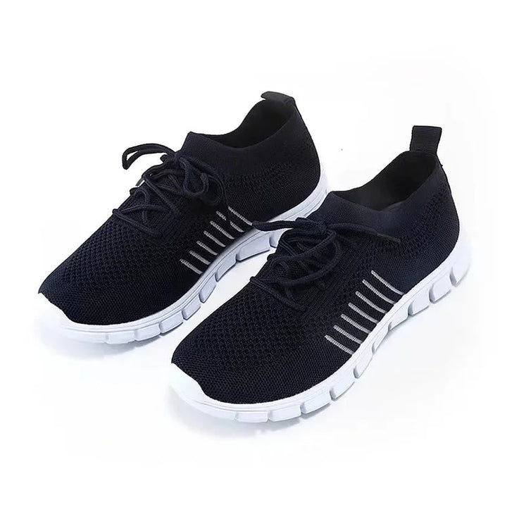 Marineblaue Damen-Sneakers mit orthopädischer Sohle für optimalen Komfort und Luftdurchlässigkeit, ideal für den Alltag.