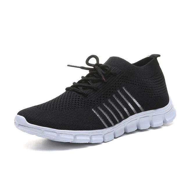 Schwarze Damen Sneakers mit orthopädischer Sohle, atmungsaktiv und bequem für den Alltag.