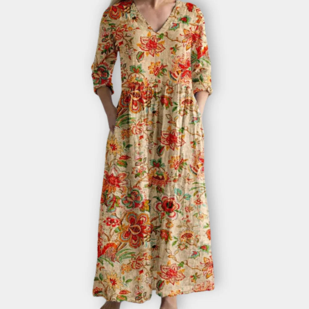 Maxikleid mit Blumenmuster in Beigetönen, luftig-leicht und perfekt für den Sommer, mit verspieltem Design für lässige Looks.