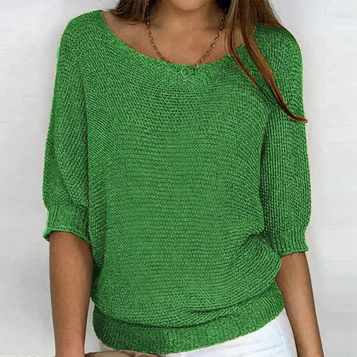 Grüner Damen 3/4 Arm Pullover mit Rundhalsausschnitt aus weicher Baumwolle, lässigem Schnitt und breitem Bündchen.