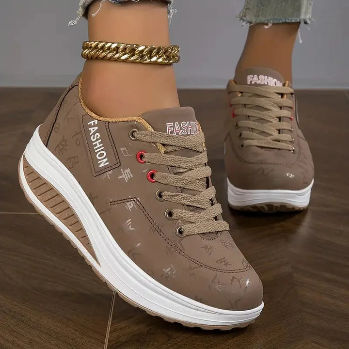 Braune Damen Air Cushion Sneakers aus atmungsaktivem Mesh mit sportlichem Design und bequemer Sohle.