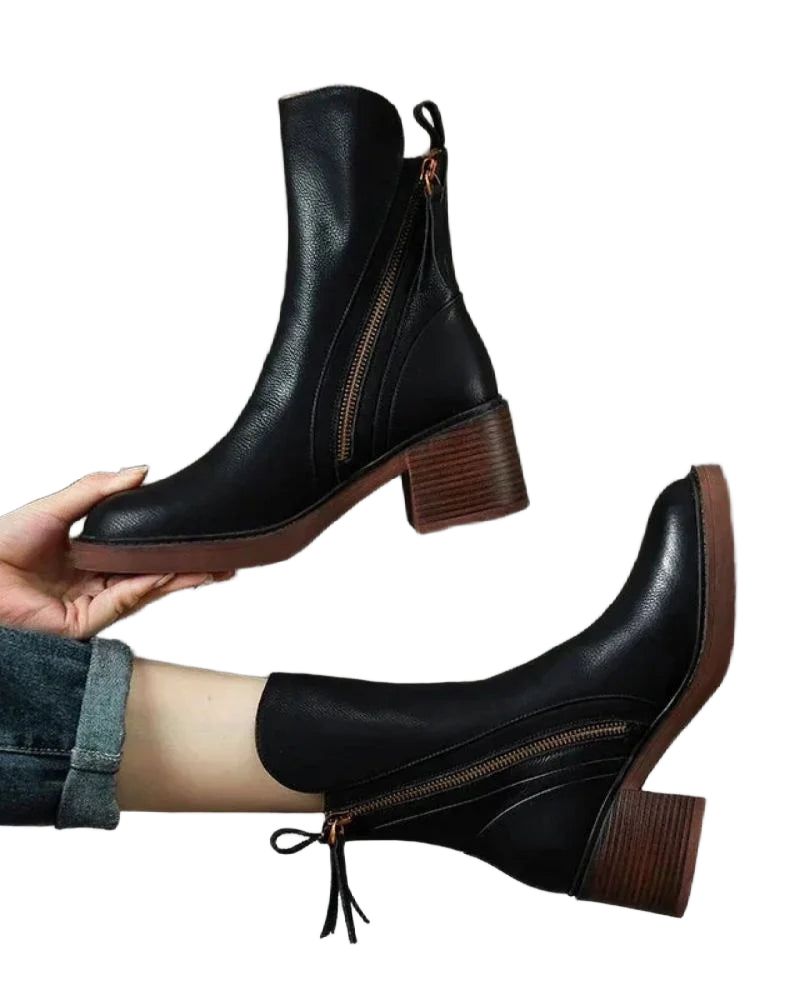 Schwarze Damen Ankle Boots aus Leder mit Reißverschluss und stabilen Blockabsätzen für Alltag und Freizeit.