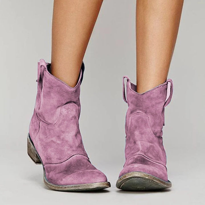 Violette Damen Ankle Booties aus Leder mit Seitenschlaufen, Blockabsatz und modernem Design für alltägliche Outfits.