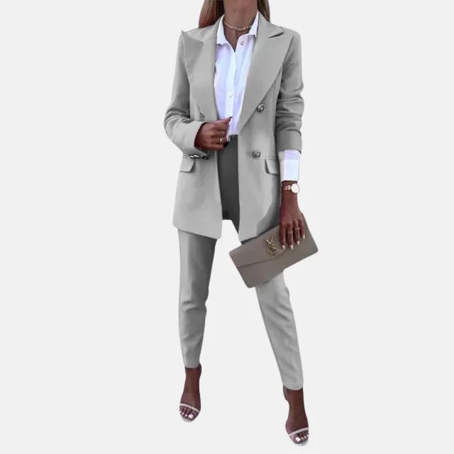 Damen Anzug Set aus schwarzem Polyester mit elegantem Blazer und passender Hose, ideal für formelle Anlässe.
