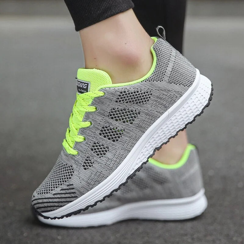 Damen Sneakers aus atmungsaktivem Material mit ergonomischer Sohle in schlichtem Design.