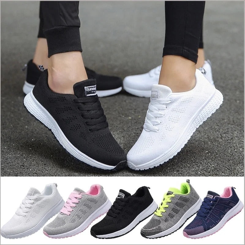 Damen Sneakers mit atmungsaktivem Material und ergonomischer Sohle, sportliches Design in Grau und Weiß.