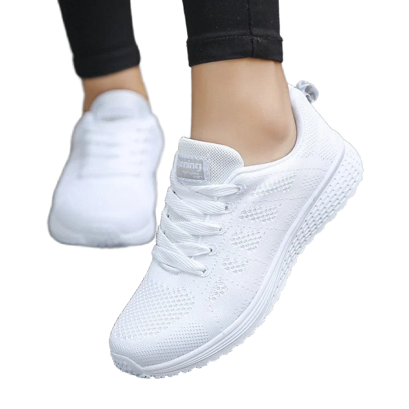Weiß Damen Sneakers mit atmungsaktivem Material und ergonomischer Sohle, perfekt für den Alltag oder sportliche Aktivitäten.