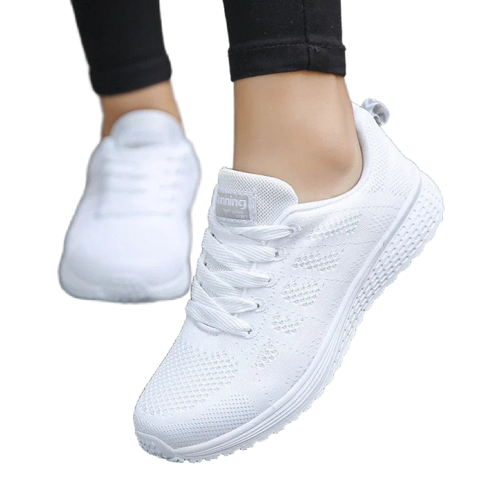 Weiß Damen Sneakers mit atmungsaktivem Material und ergonomischer Sohle, perfekt für den Alltag oder sportliche Aktivitäten.