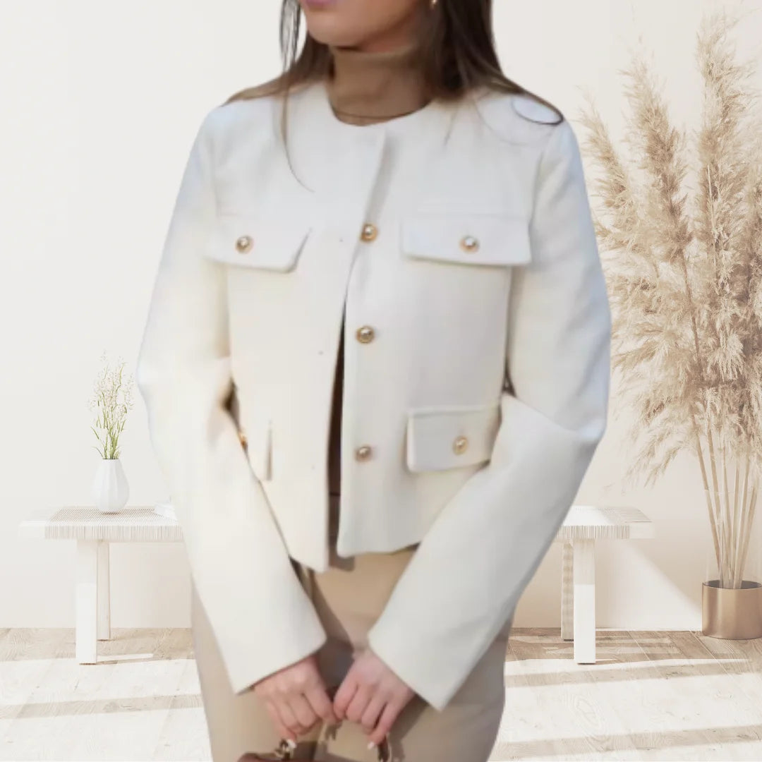 Damen Blazer aus hochwertigem Baumwollmaterial mit Knopfdetails und geradem Schnitt in klassischem Design.