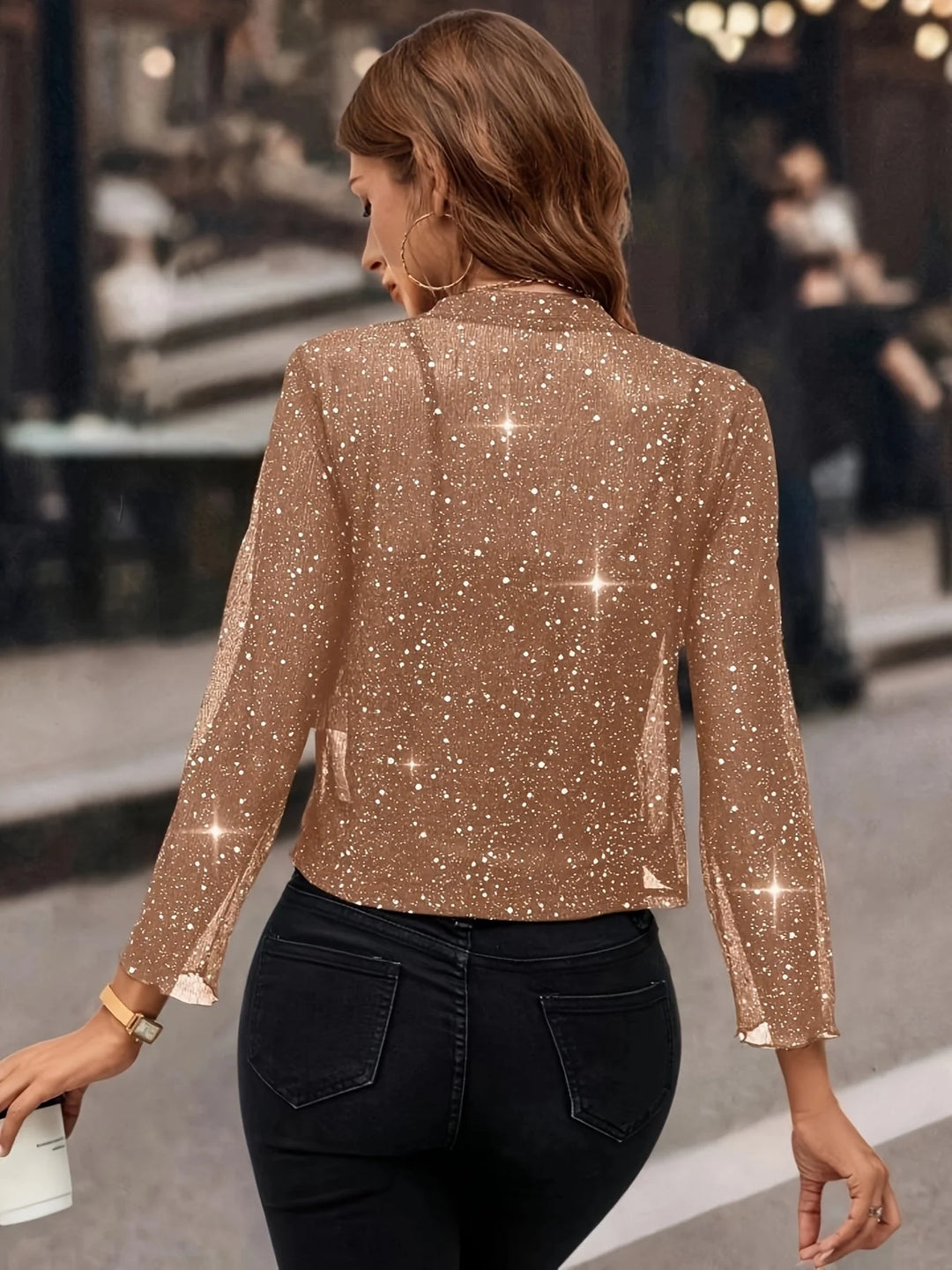 Damen Blazerjacke aus weichem Stoff mit schimmernden Pailletten, ideal für besondere Anlässe und elegante Auftritte.