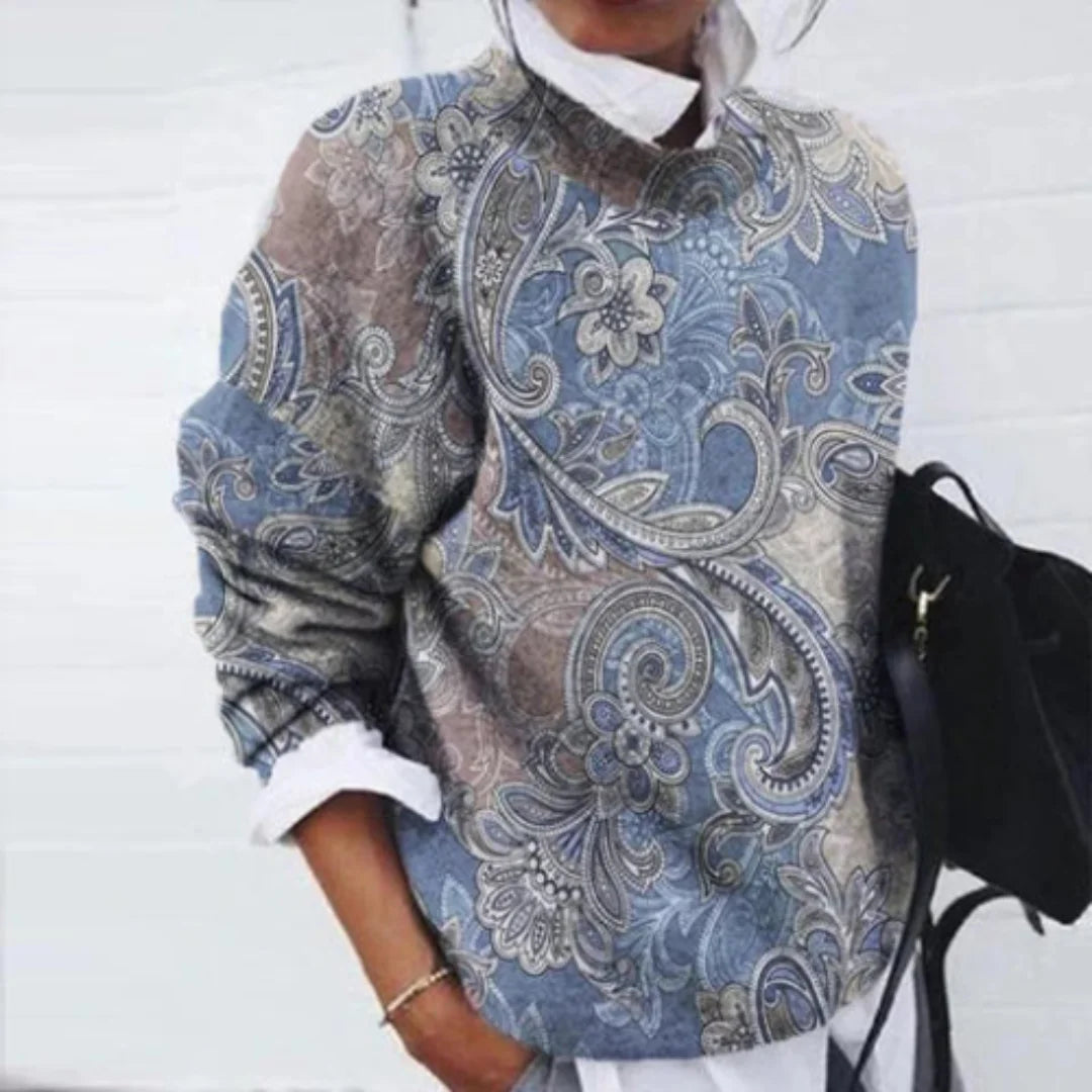 Damen Blumenpullover in Blau mit Paisley-Muster, Rundhalsausschnitt und weichem, bequemem Material. Ideal für den Alltag.