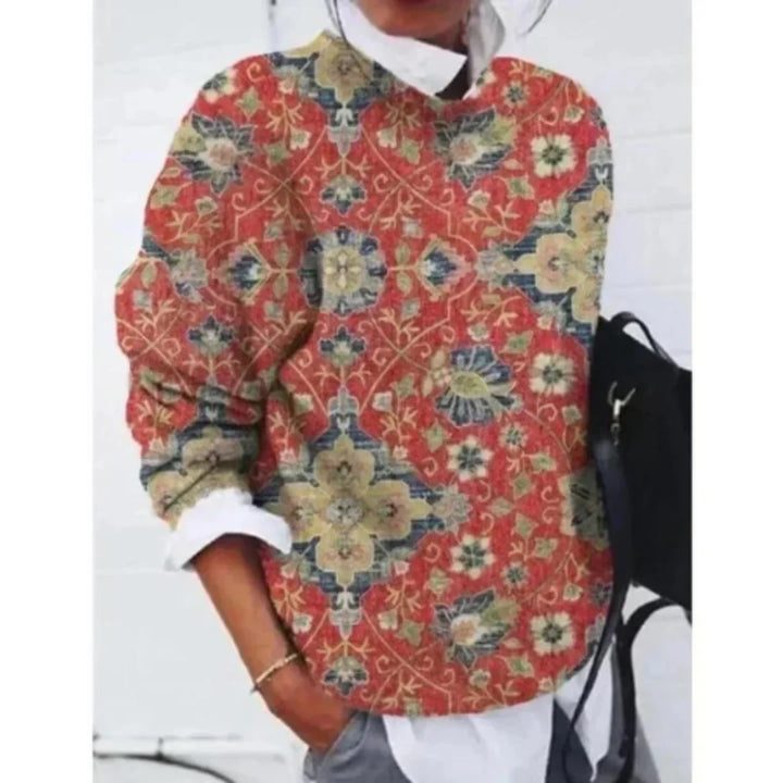 Roter Damen Blumenpullover mit Paisley-Muster, Rundhalsausschnitt und weichem Material für angenehmen Tragekomfort.