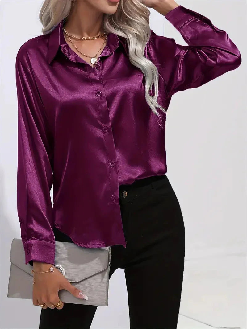 Damen Bluse aus Satin mit eleganten Knöpfen, weicher Stoff und klassischer Schnitt, ideal für festliche Anlässe.
