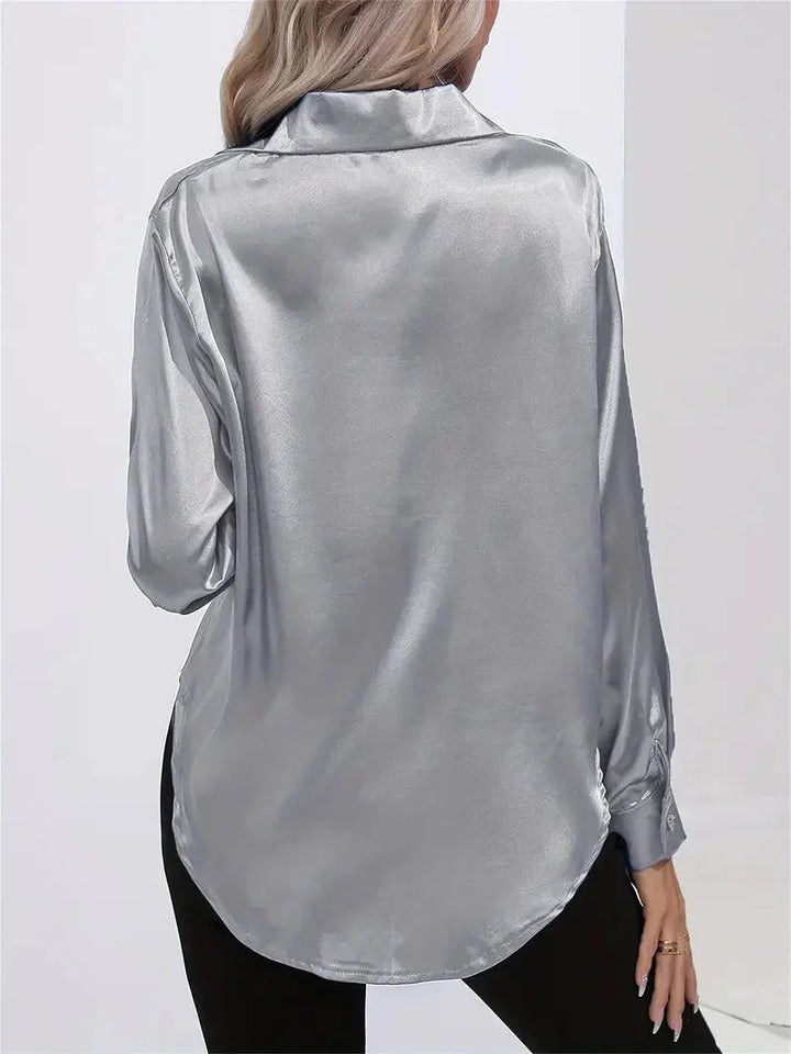 Damen Bluse aus Satin mit eleganten Knöpfen, weich im Griff, schicke Passform, ideal für formelle Anlässe oder den Alltag.