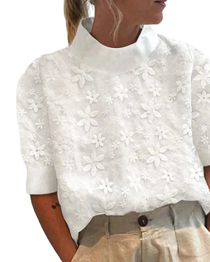 Damenbluse in Weiß mit besticktem Stehkragen aus leichtem Baumwollmix, ideal für den Alltag und vielseitig kombinierbar.