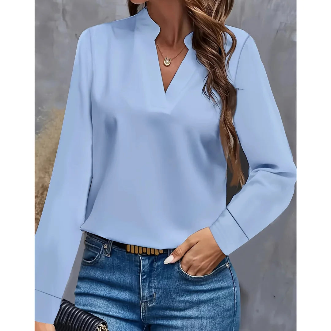 Damen Bluse in Blau, langärmlig, V-Ausschnitt, aus atmungsaktivem Material, ideal für Büro-Outfits.