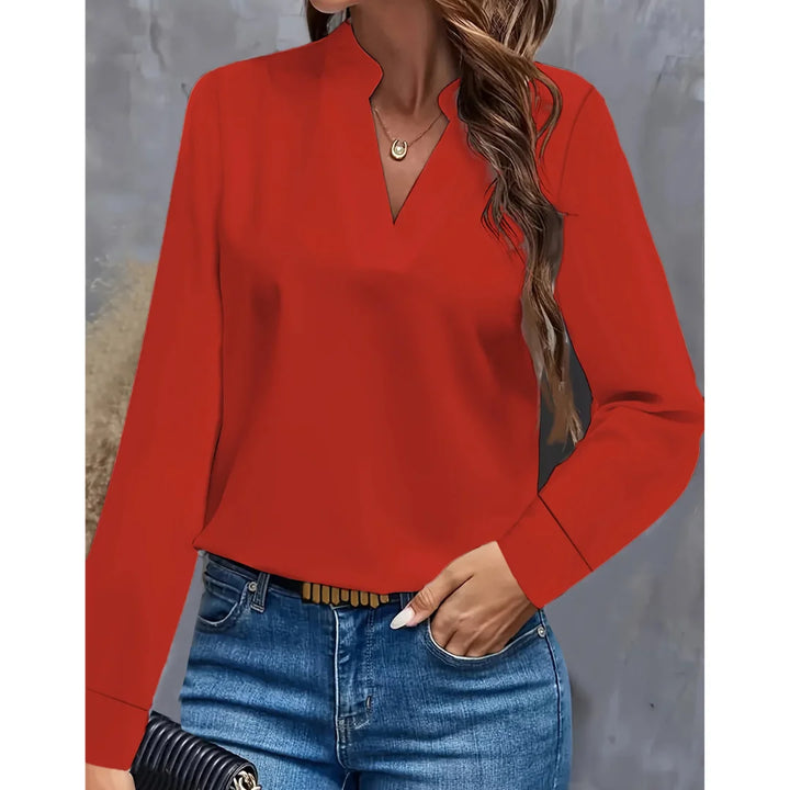 Rote Damen Bluse mit Langarm und V-Ausschnitt, aus atmungsaktivem Material, ideal für das Büro oder formelle Anlässe.