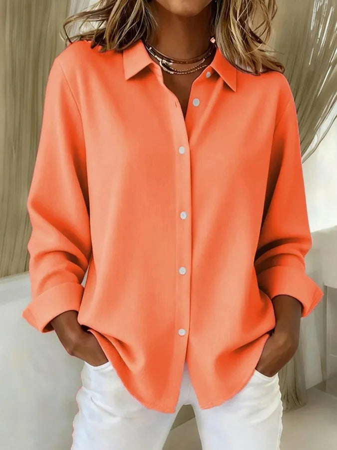 Orange Damen Bluse aus Baumwolle mit eleganter Knopfleiste und klassischem Kragen, ideal für vielseitige Looks.