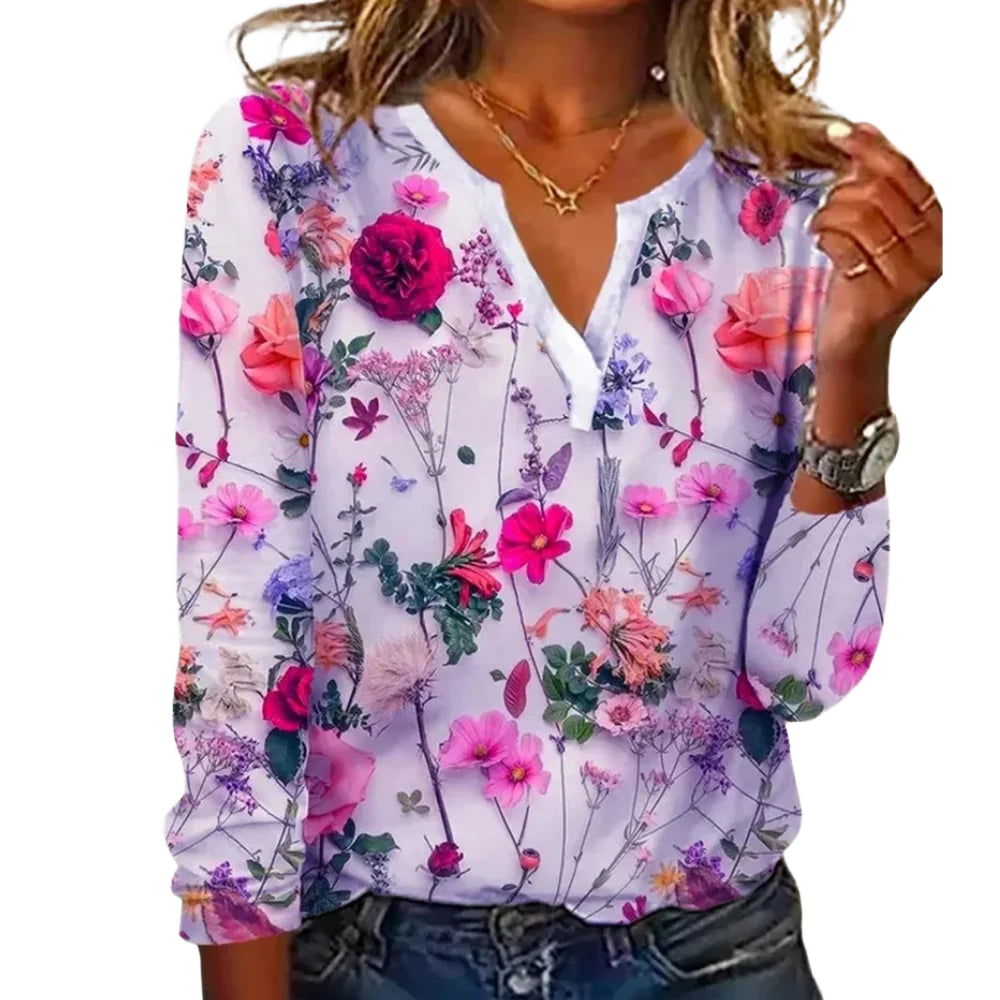 Damen Bluse in lila mit floralem Muster, V-Ausschnitt und leichtem, atmungsaktivem Material für den täglichen Komfort.