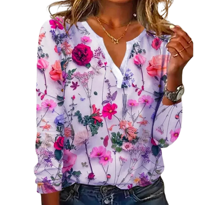 Damen Bluse in lila mit floralem Muster, V-Ausschnitt und leichtem, atmungsaktivem Material für den täglichen Komfort.