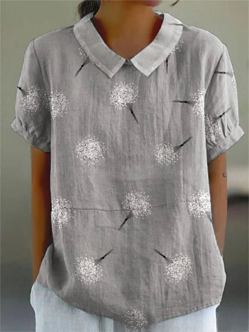 Damen Bluse aus leichtem Stoff mit floralem Stickmuster, kurzen Ärmeln, ideal für den Sommerlook.