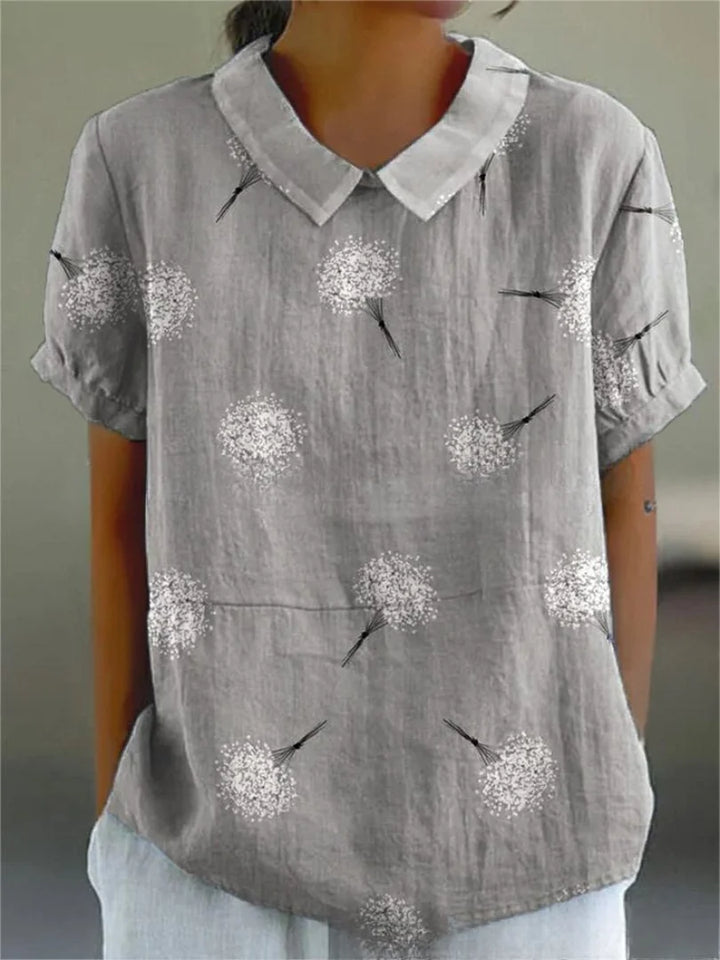 Damen Bluse aus leichtem Stoff mit floralem Stickmuster, kurzen Ärmeln, ideal für den Sommerlook.