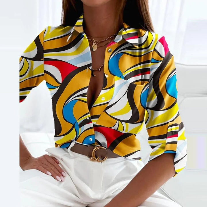 Damen-Bluse aus leichtem Stoff mit Umlegekragen und grafischem Muster, ideal für Büro oder Freizeitlooks.