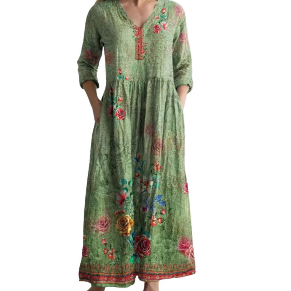 Grünes Maxikleid für Damen mit Blumenmuster, perfekt für den Boho-Look. Aus leichtem Stoff mit figurschmeichelnder Passform.