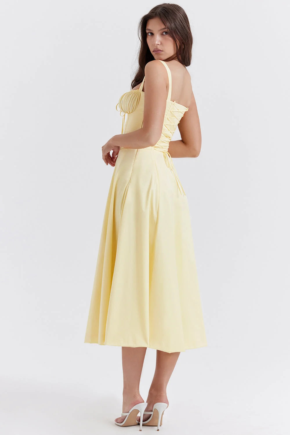 Schwarzes Damen Bustier-Kleid mit Blumenmuster, figurbetontem Schnitt und floralen Details aus leichtem Stoff.
