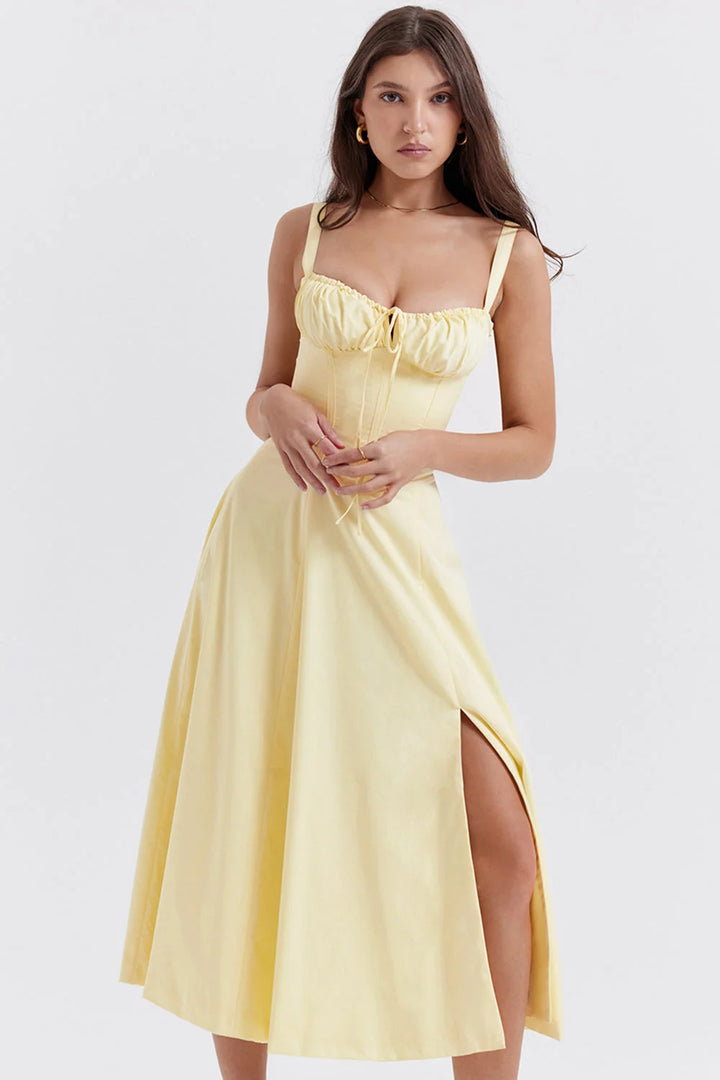 Gelbes Damen Bustier-Kleid mit Blumen-Print aus leichtem Stoff und modernem Schnitt für den sommerlichen Freizeit-Look.