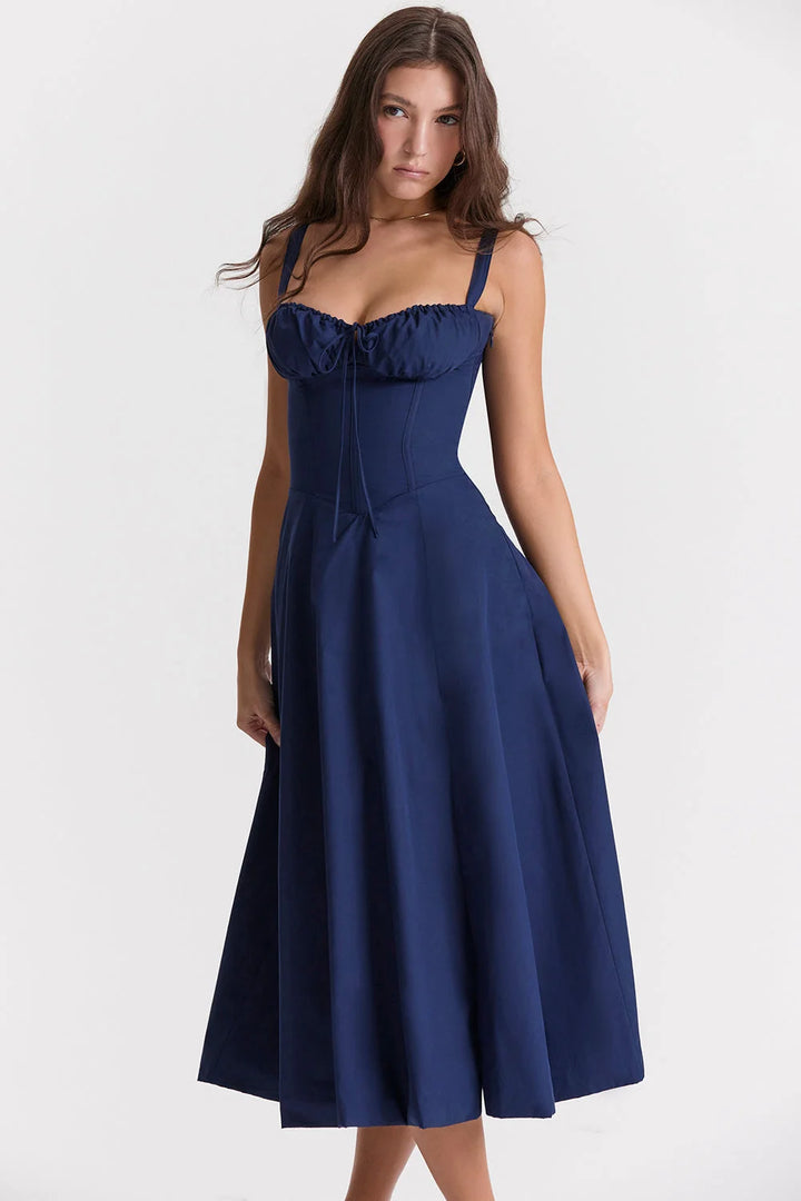 Marineblaues Damen Bustier-Kleid mit Blumen-Print und modernem Schnitt aus leichtem Stoff.