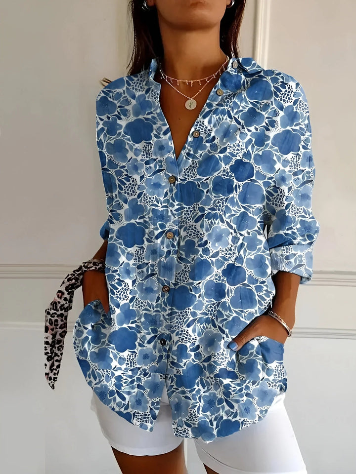 Damen Button-Down-Hemd aus Baumwolle mit Langarm und Blumenmuster in Dunkelblau.